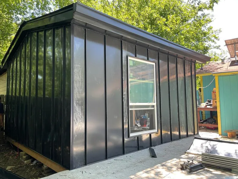 Black standing seam metal wall panels for Metal Roof Installation in Quincy